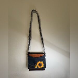 Chala Navy Blue Sunflower messenger crossbody vegan leather bag. NWT